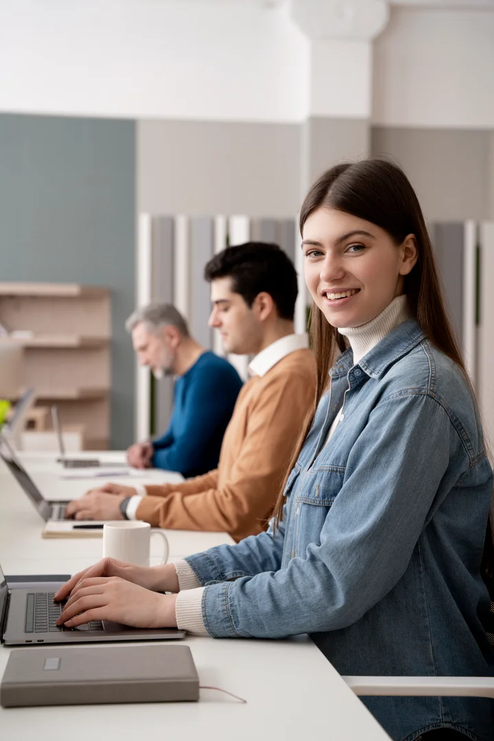 Professionals collaborating in a modern office, highlighting IT staff augmentation services for efficient project success